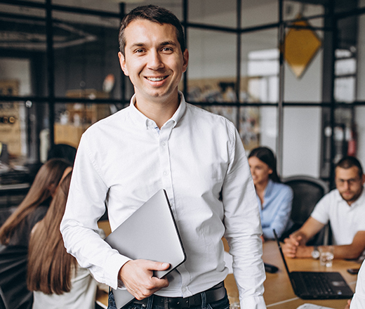 man carrying laptop